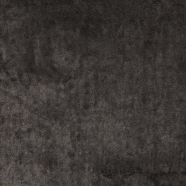 Close-up of anthracite grey fabric with softly mottled, shadowed surface texture