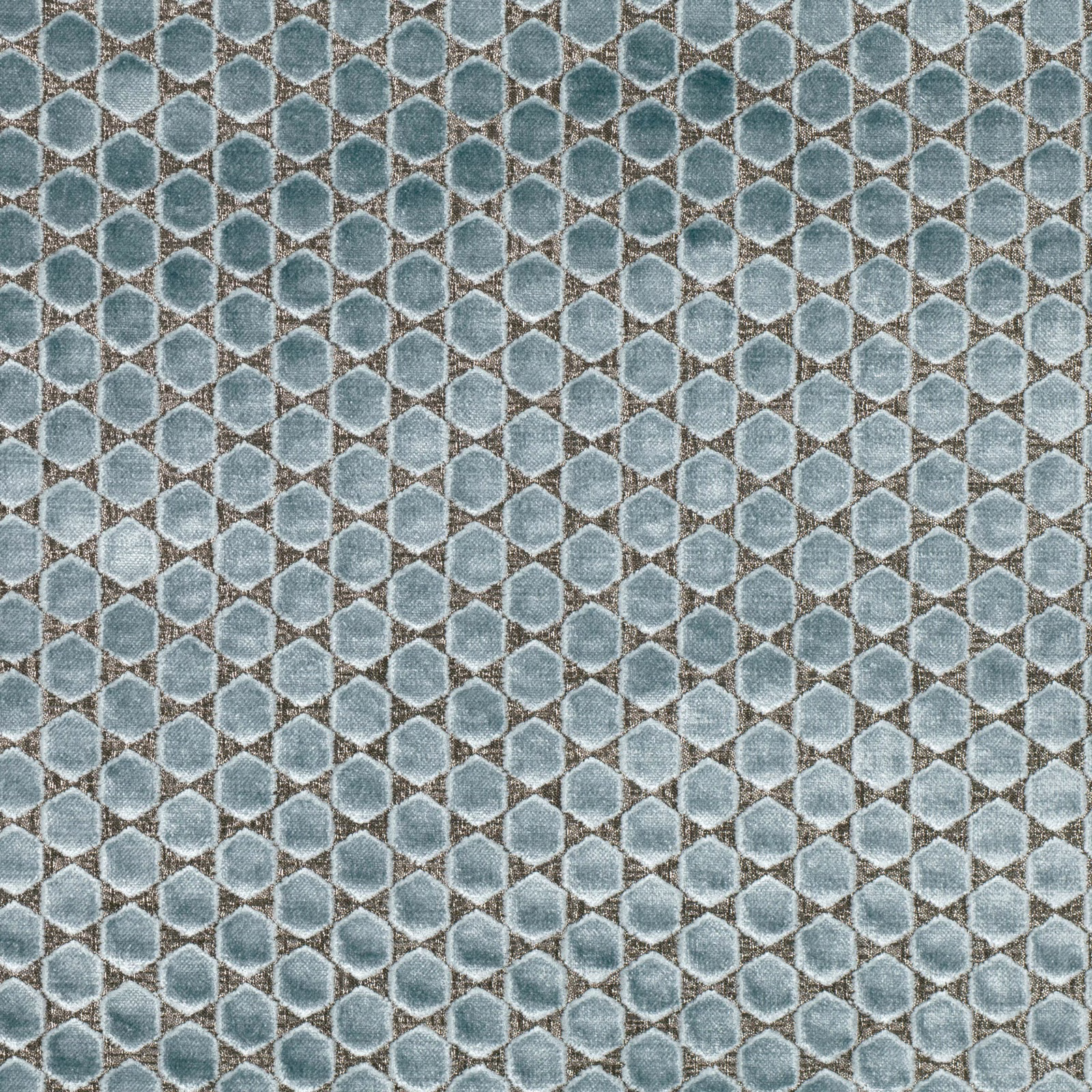 Close view of muted French blue hexagons with pale textured outlines