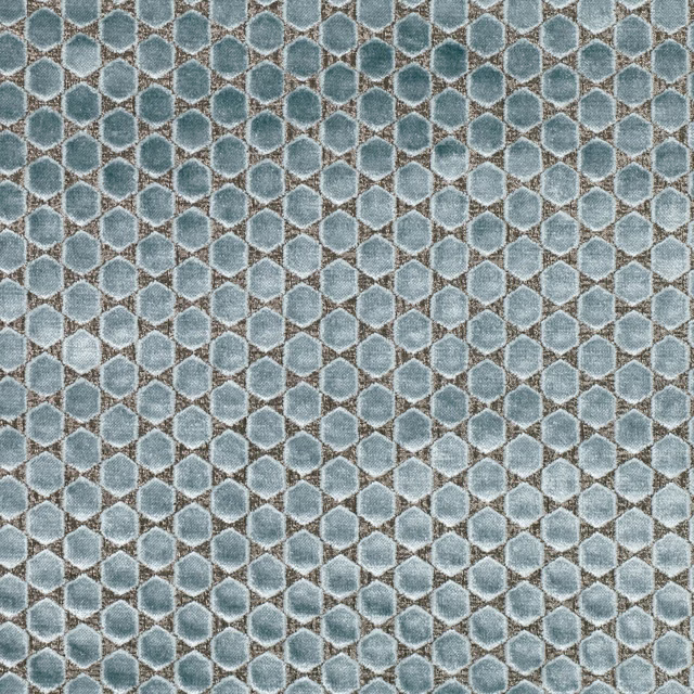 Close view of muted French blue hexagons with pale textured outlines