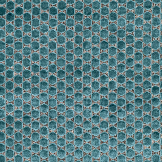 Close view of viridian teal rounded hexagons with warm taupe edging and tactile texture