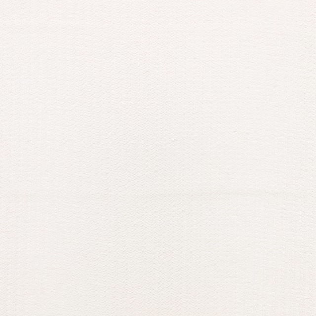 Whitewash textile with a fine, softly rippled woven surface