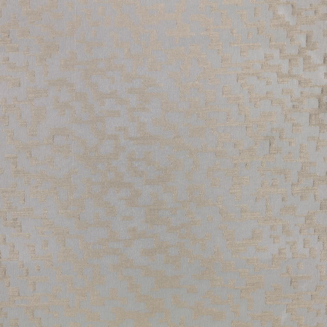 Pale soft-gold woven textile with broken geometric blocks and subtle blue-grey depth