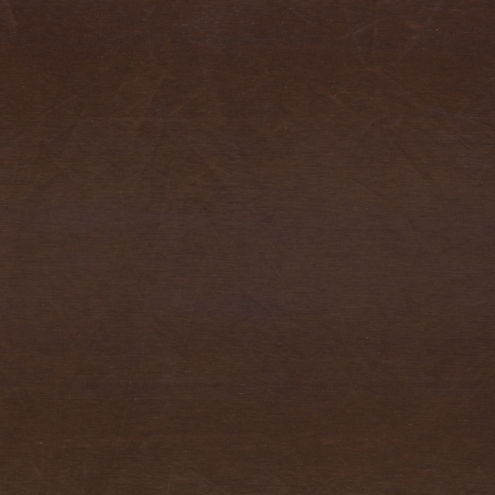 Close-up of dark copper-brown woven fabric with fine tonal striations and low sheen
