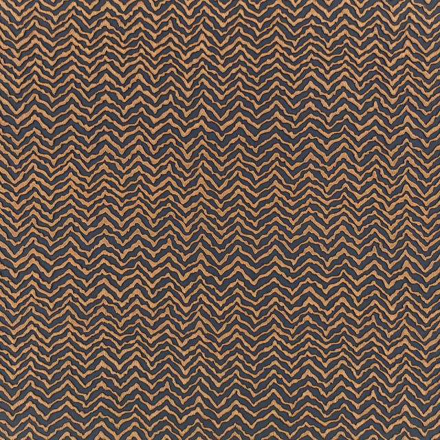 Burnished copper zigzags over a dark charcoal ground in a tactile fabric