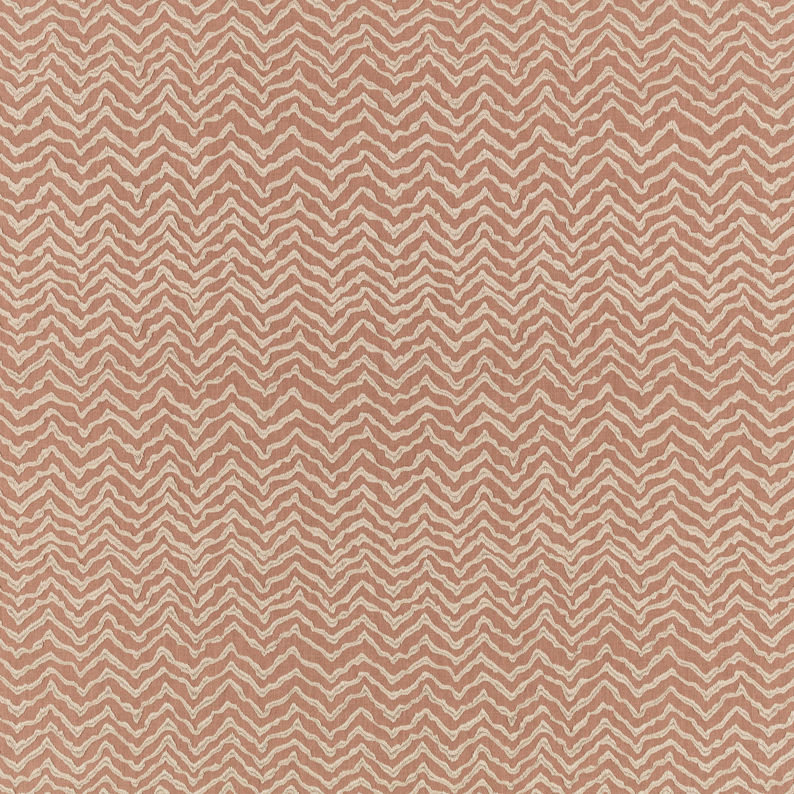 Muted plaster-blush woven fabric with fine cream zigzags in a small repeat