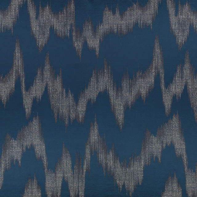 Deep petrol-blue textile with silver-grey, jagged woven strokes in a vertical repeat