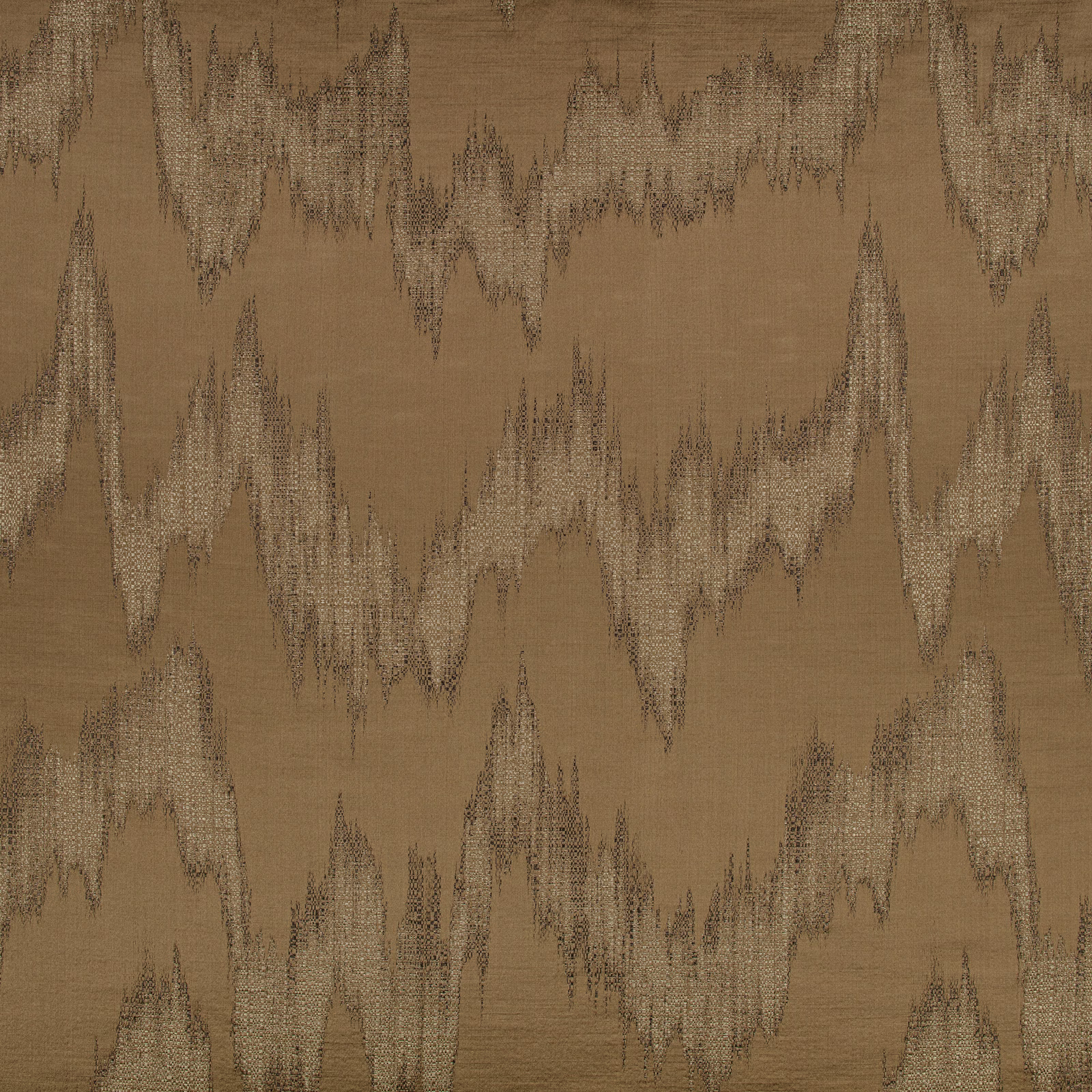 Warm spice-brown fabric with jagged beige and charcoal ikat motifs