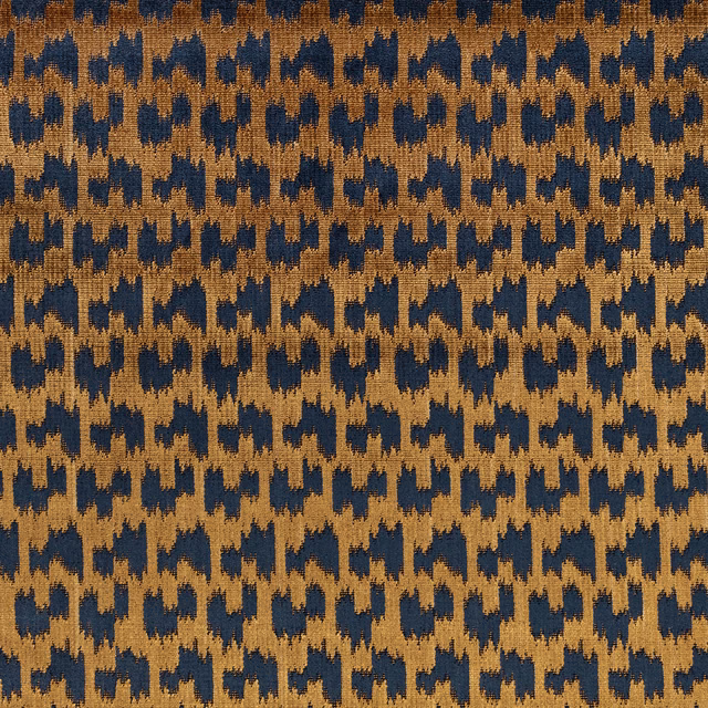 Ochre and deep navy jagged geometric weave with a tactile, broken surface