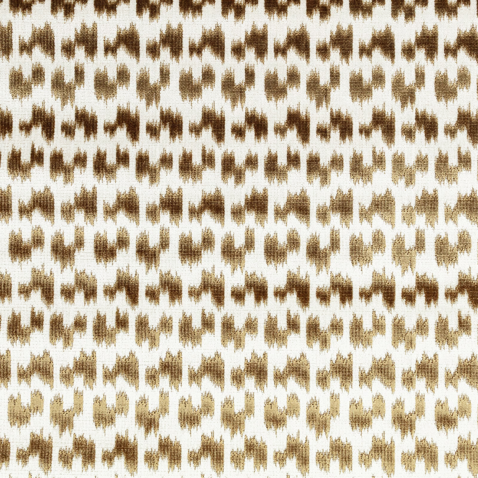Cream woven fabric with irregular old-gold and brown ikat-style motifs