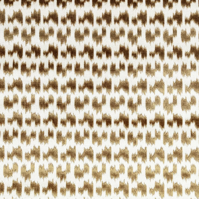 Cream woven fabric with irregular old-gold and brown ikat-style motifs