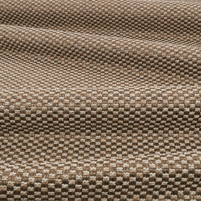 Close-up of Nava Sepia’s warm sepia and cream checked, looped weave