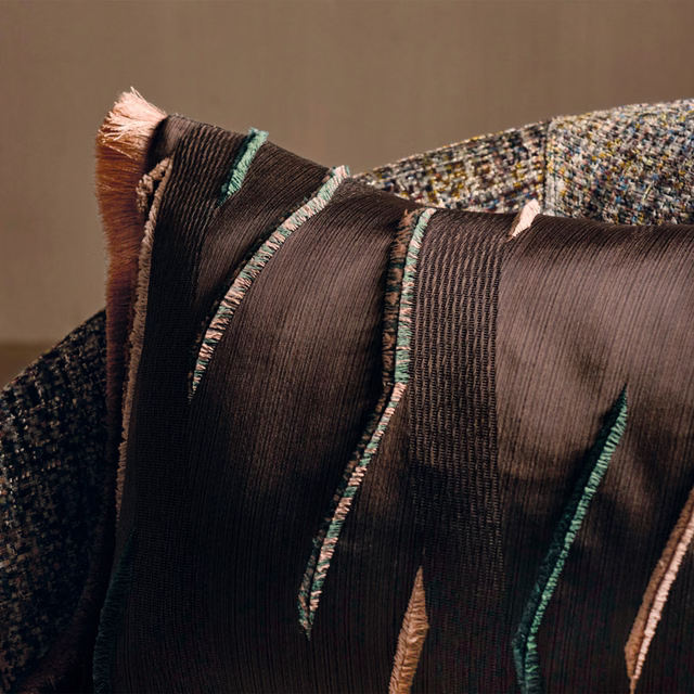 Deep cacao ribbed textile with irregular teal, cream and rust linear detailing