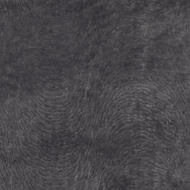 Charcoal grey textile with dense plush pile and rippling organic striations