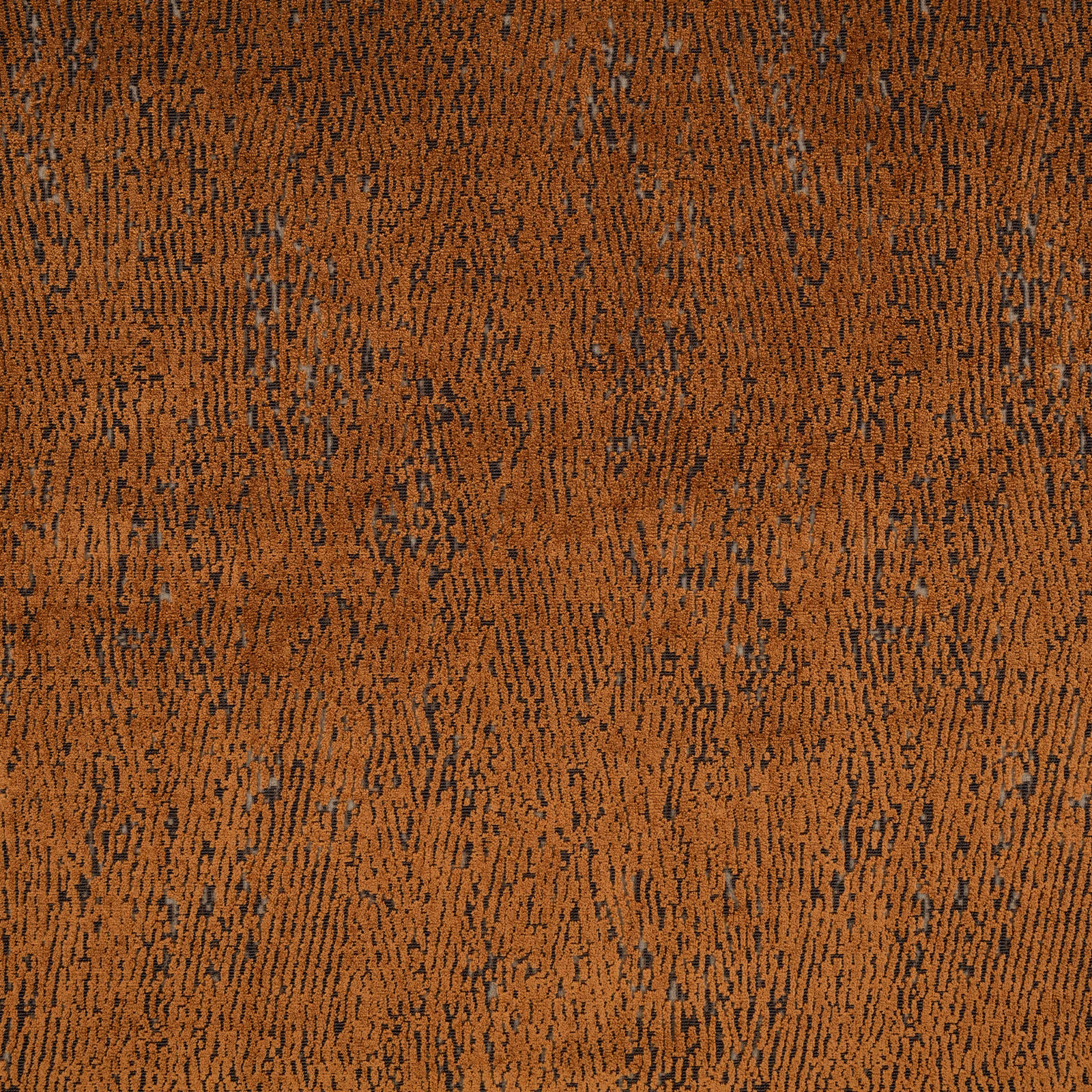 Copper-brown woven textile with dark, irregular vertical flecks and nubby texture