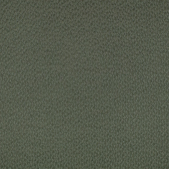 Close-up of muted jade-green fabric with fine, rippled woven texture