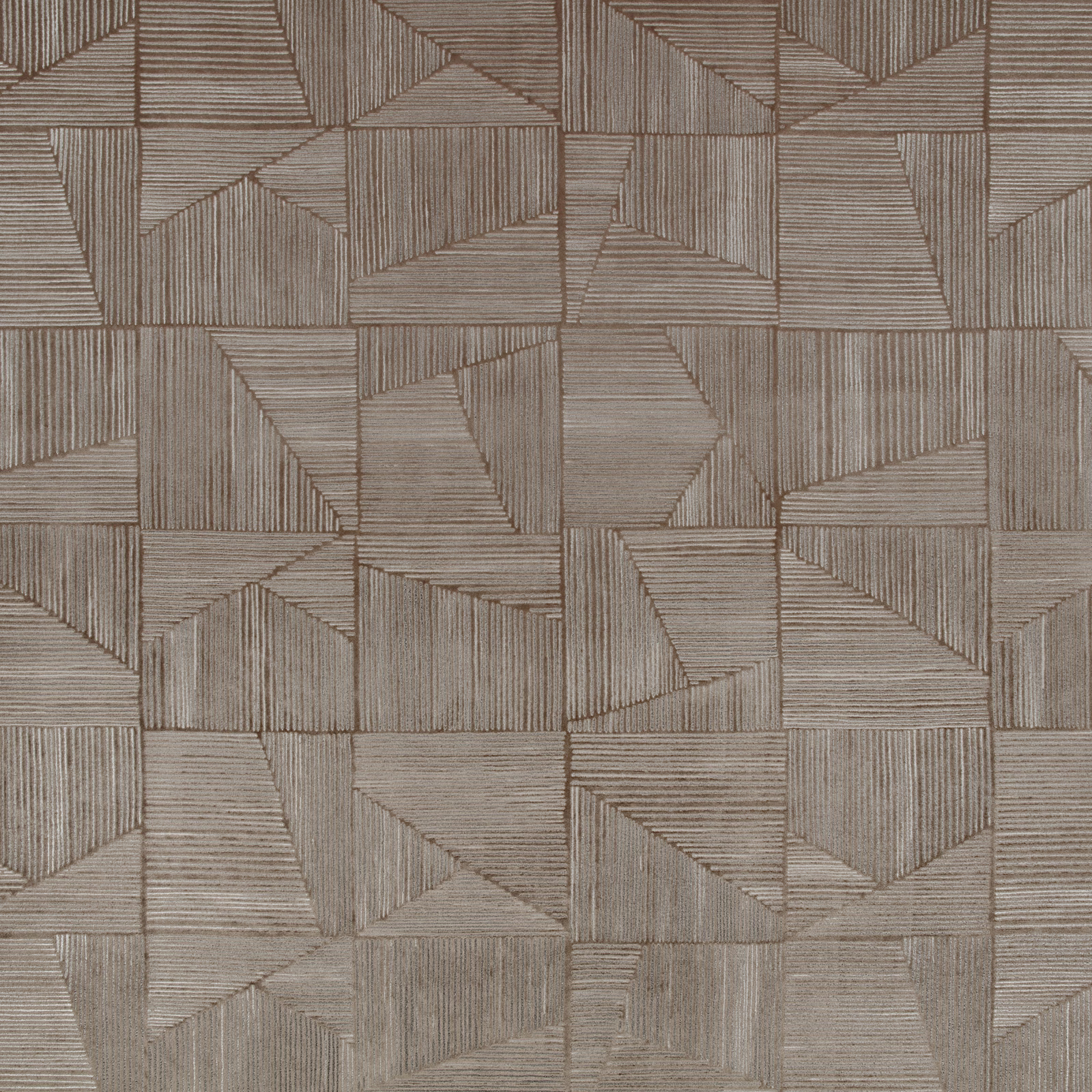 Warm taupe-grey fabric with angular patchwork blocks and fine directional ribbed lines