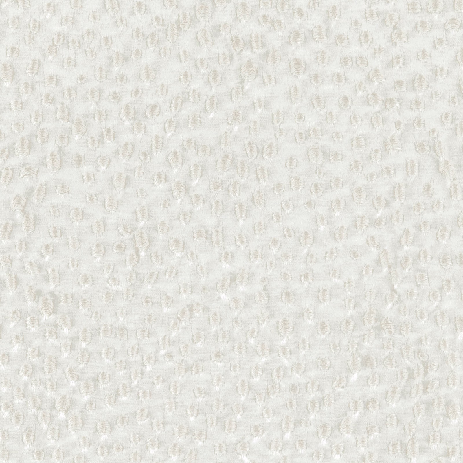 Pale opaline ivory fabric with a small raised loop motif and soft woven texture