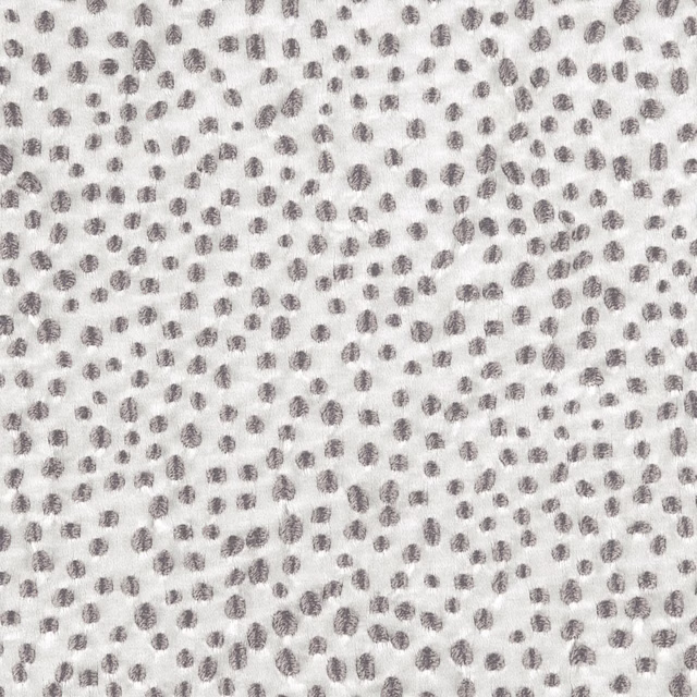 Ivory woven fabric with dense greige pebble marks and soft fibre texture