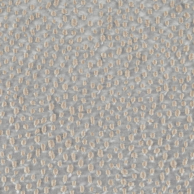 Cool blue-grey weave with scattered raised beige flecks and soft tactile depth