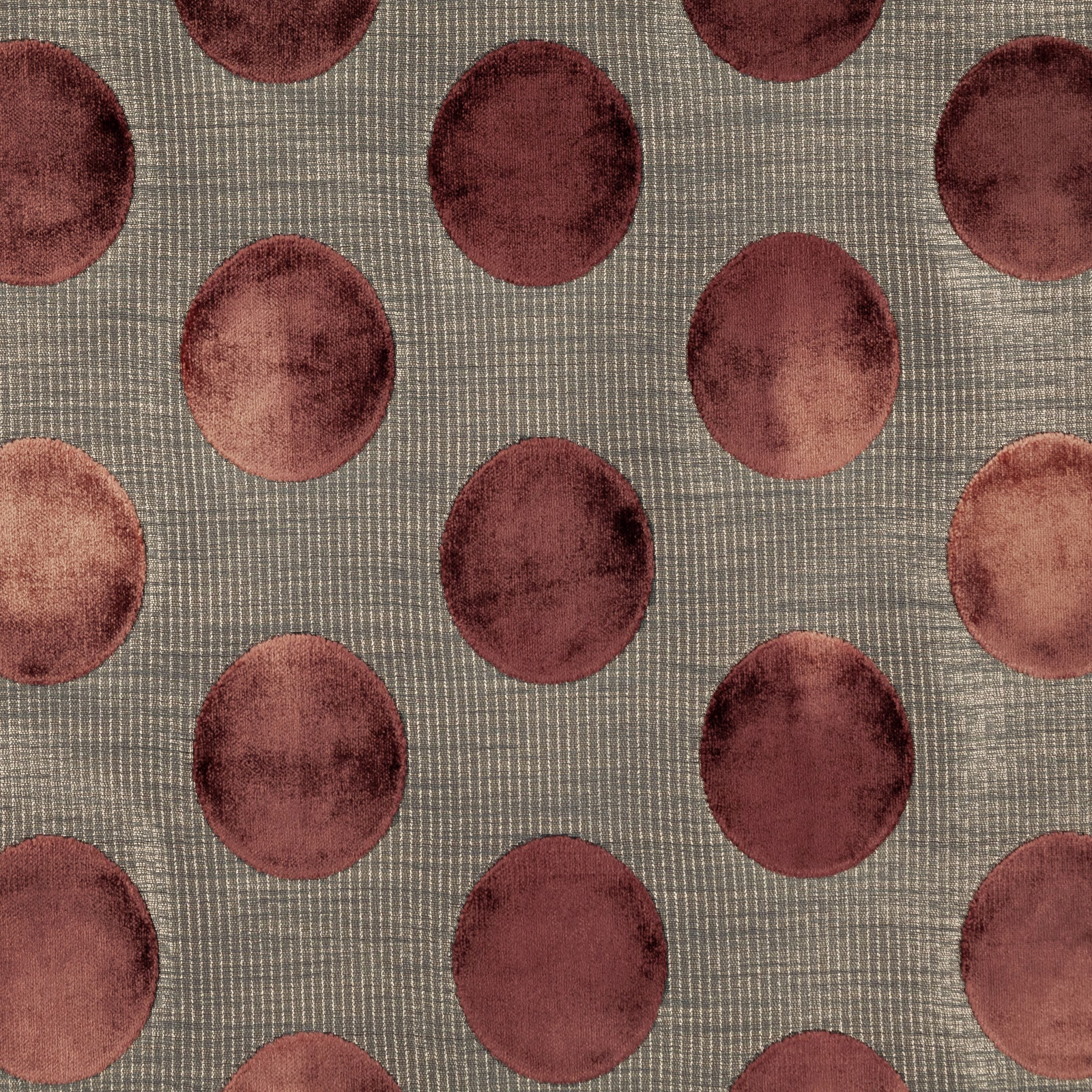 Taupe-grey woven fabric with large mottled cinnamon and burgundy circles