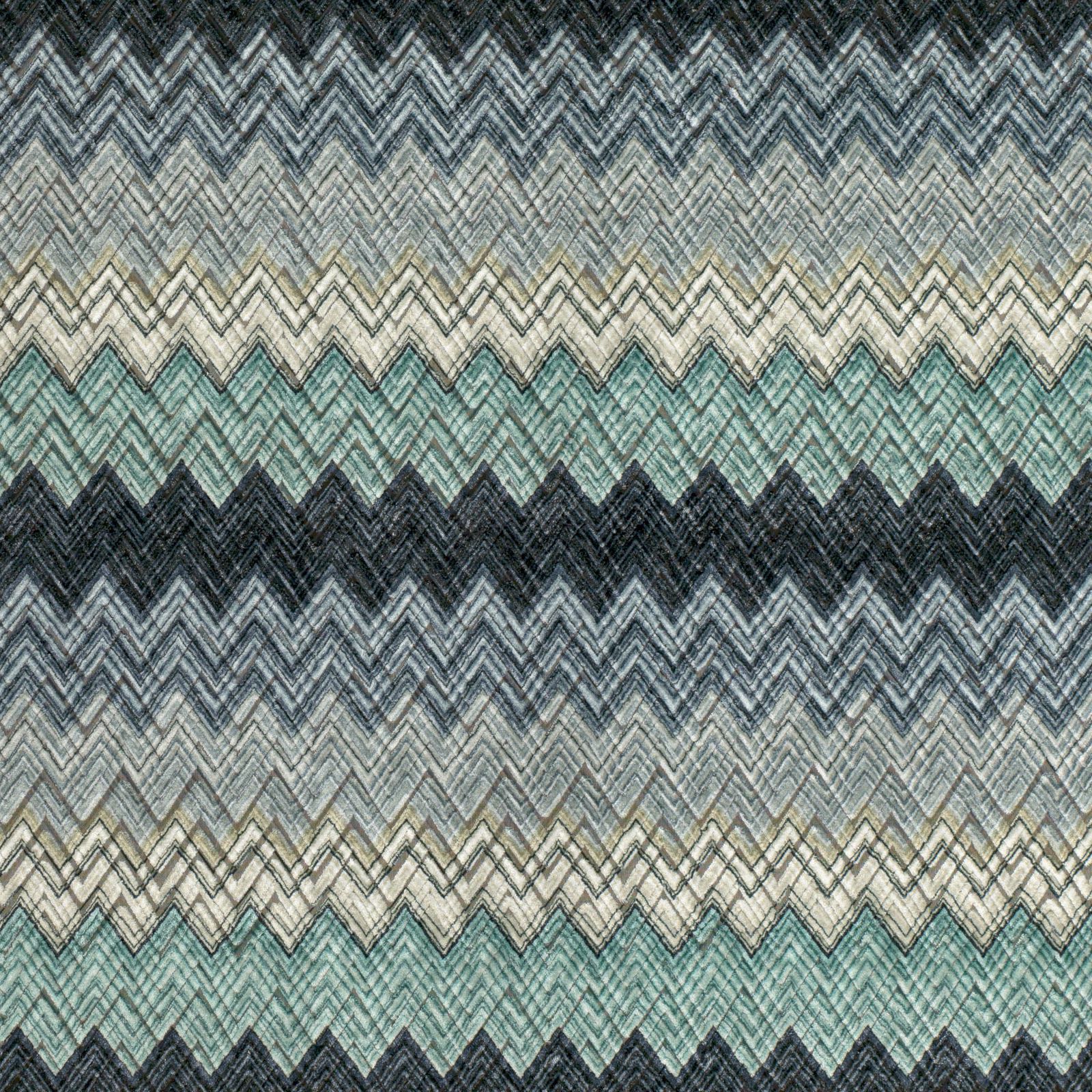 Layered teal, charcoal and ivory chevron bands in a textured woven swatch