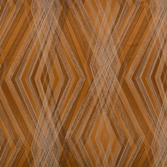 Warm copper textile with layered ivory and charcoal diamond lines