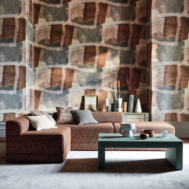 Large geometric wallpaper with rust-brown, sage-grey and cream block motifs