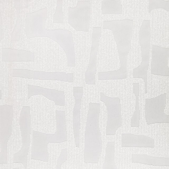 Pale cool-grey woven fabric with irregular white geometric blocks and tactile texture