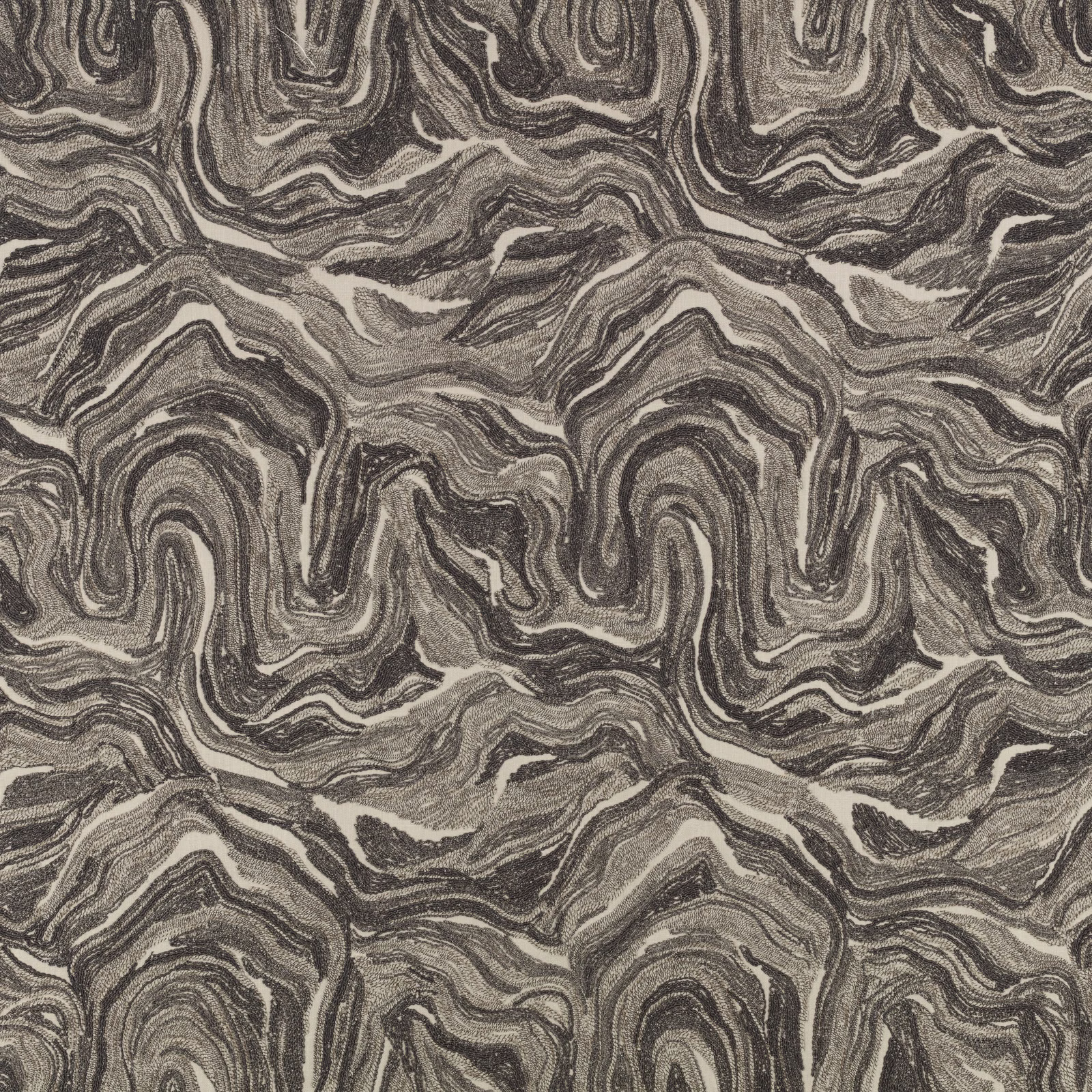 Charcoal anthracite fabric with swirling grey and taupe marbled woven pattern