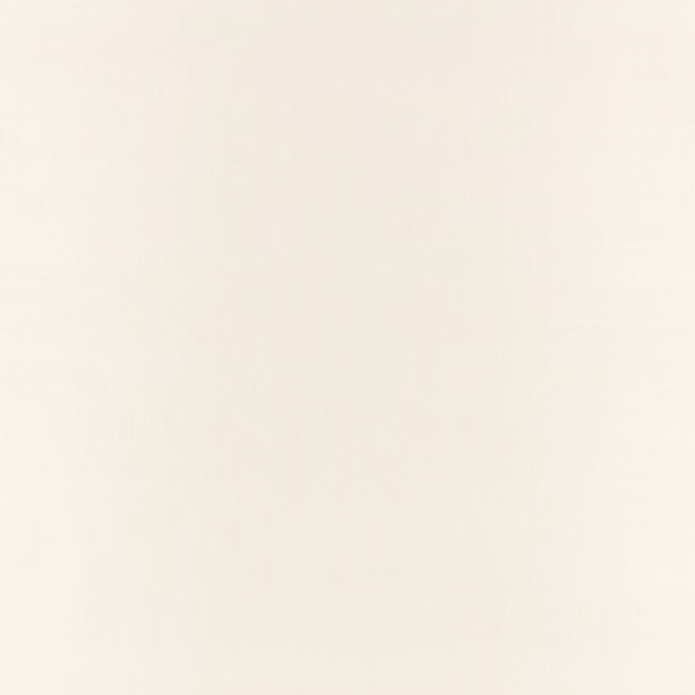Near-white Whitewash wallpaper with barely visible vertical texture and softly varied surface