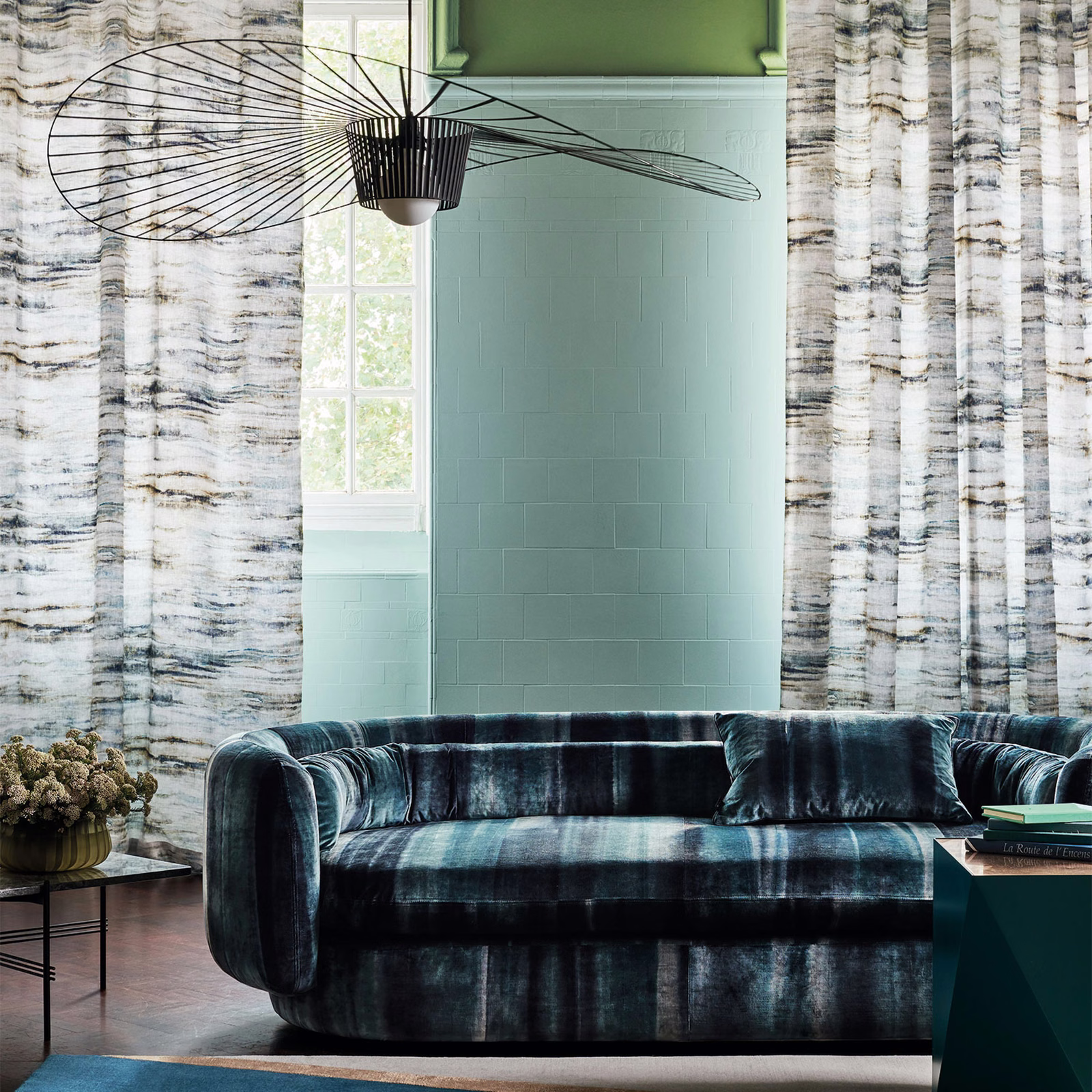 Deep indigo upholstery with pale blue-grey vertical striations and a plush surface