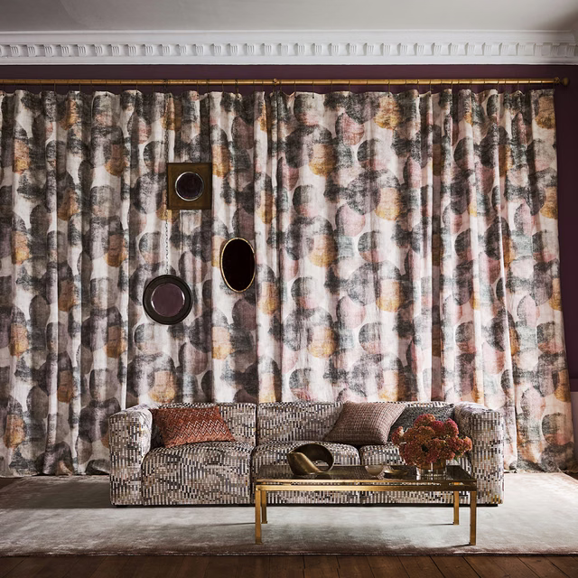 Blush pink abstract fabric with charcoal, ochre and rust vertical painterly marks