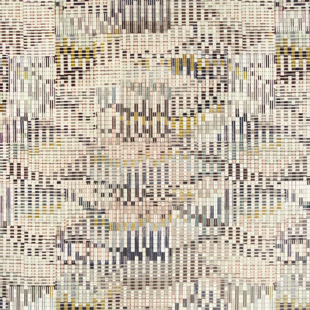 Mineral cream woven textile with charcoal grids and muted ochre blue-grey marks