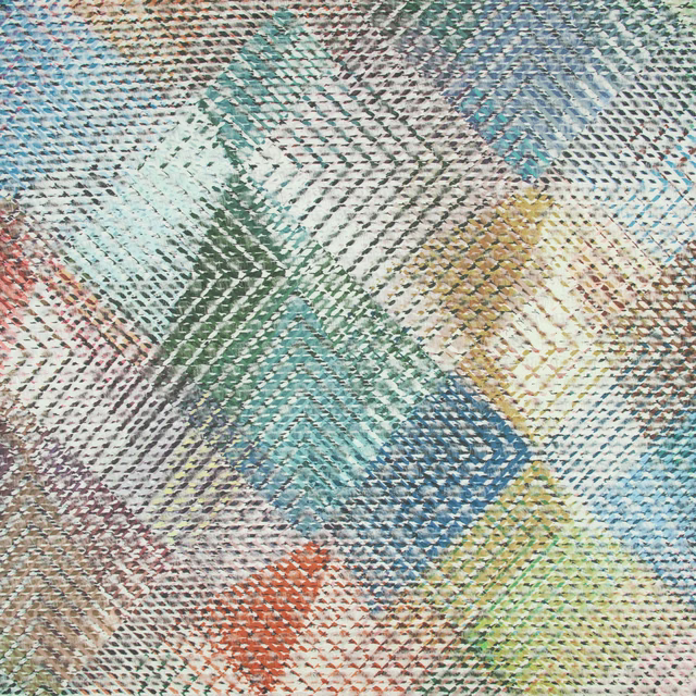 Turquoise-led woven fabric with abstract teal, blue, ochre and coral geometric patches