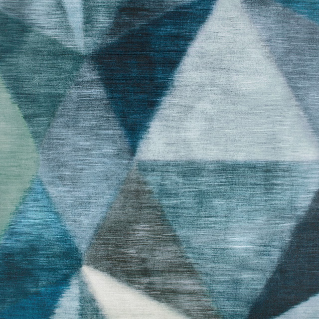 Peacock teal wallpaper with angular pale blue shapes and charcoal brushed striations