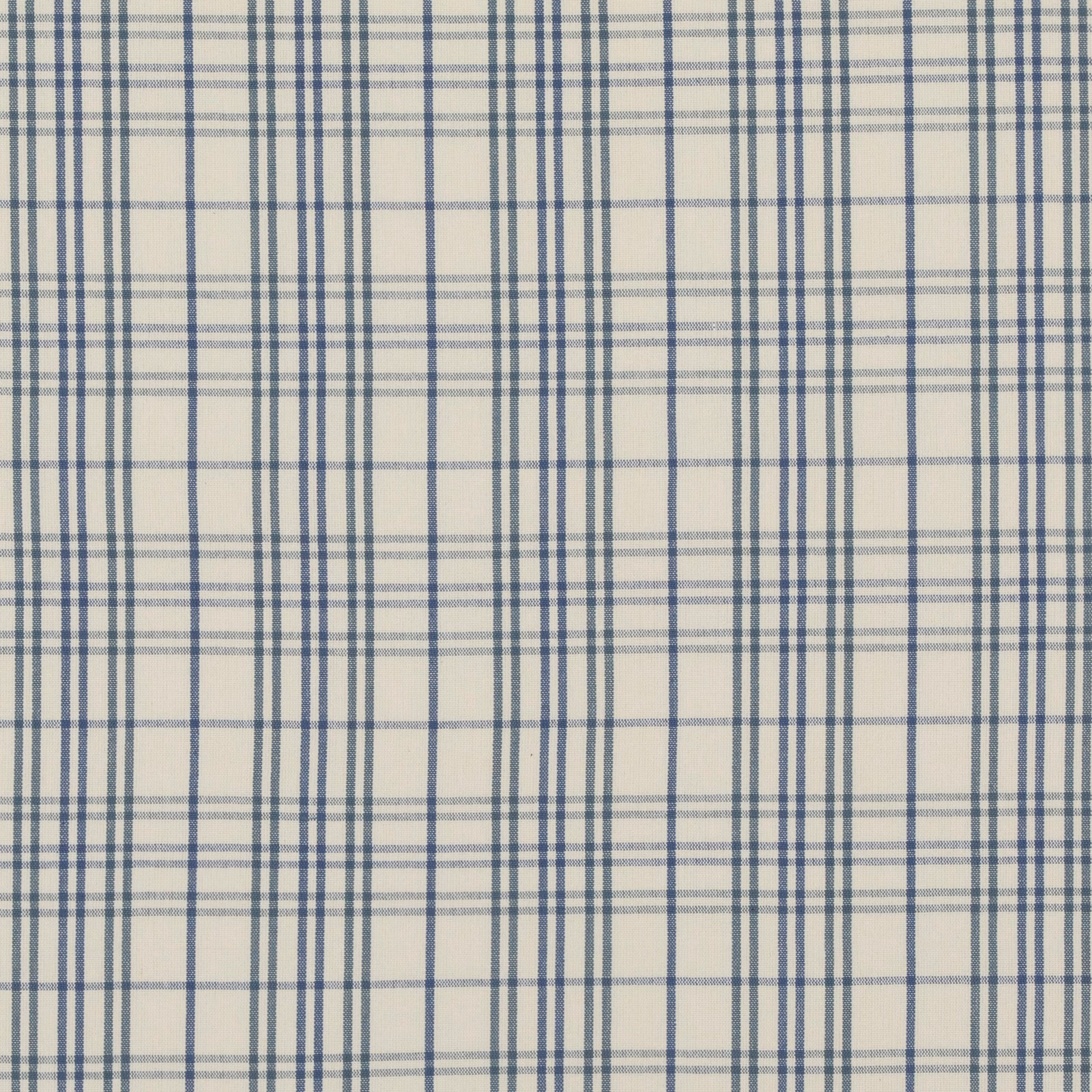 Cream cotton ground crossed by muted blue lines in a layered check