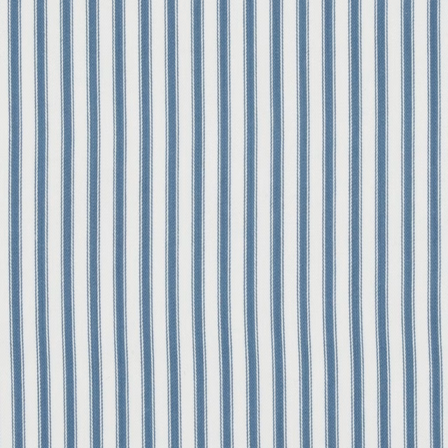 Close view of muted blue and cream narrow vertical cotton ticking stripes