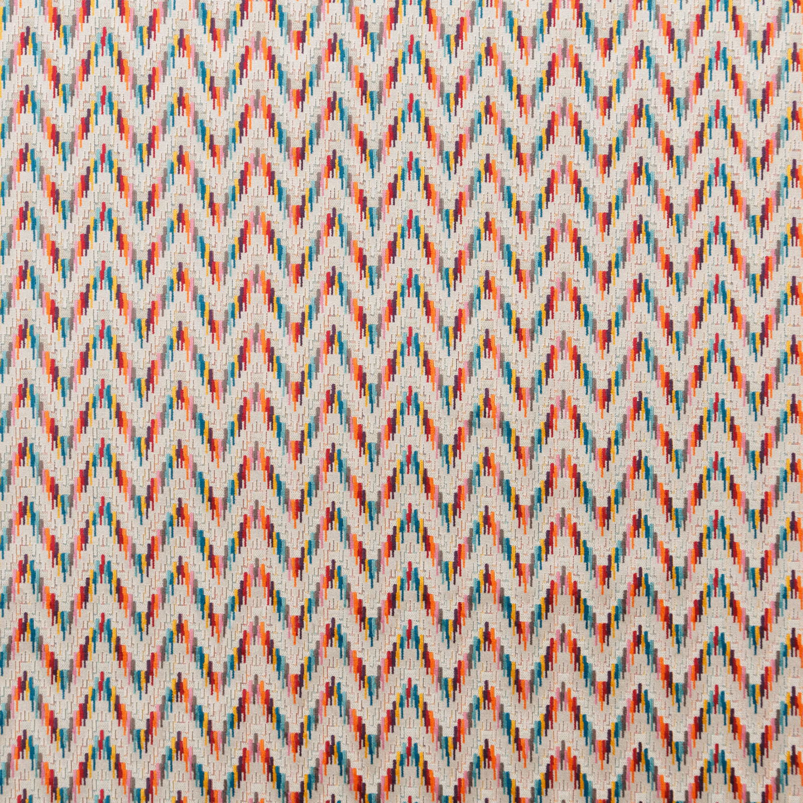Cream woven chevrons with coral, teal, blue and ochre flecks