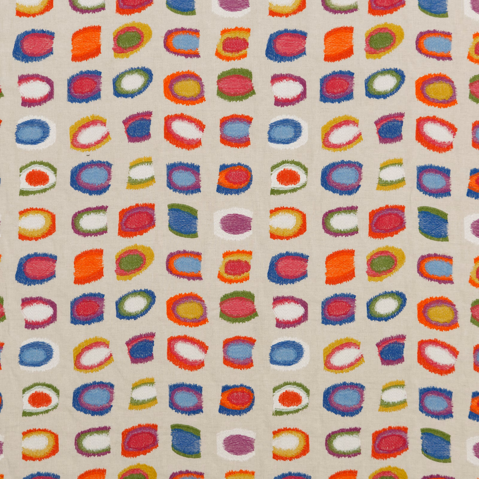 Cream textile with vivid abstract red, blue, orange, green and purple brush motifs