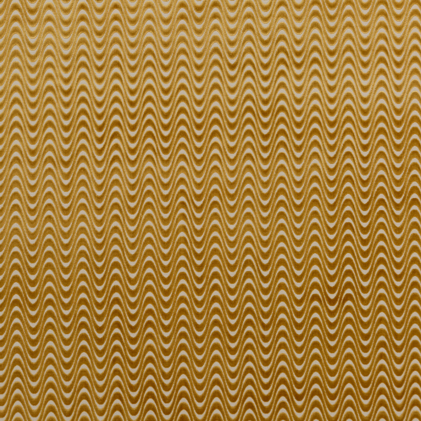 Ochre woven fabric with tightly spaced ivory undulating vertical waves