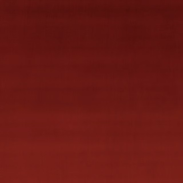 Deep cranberry red velvet swatch showing smooth pile and subtle tonal shading