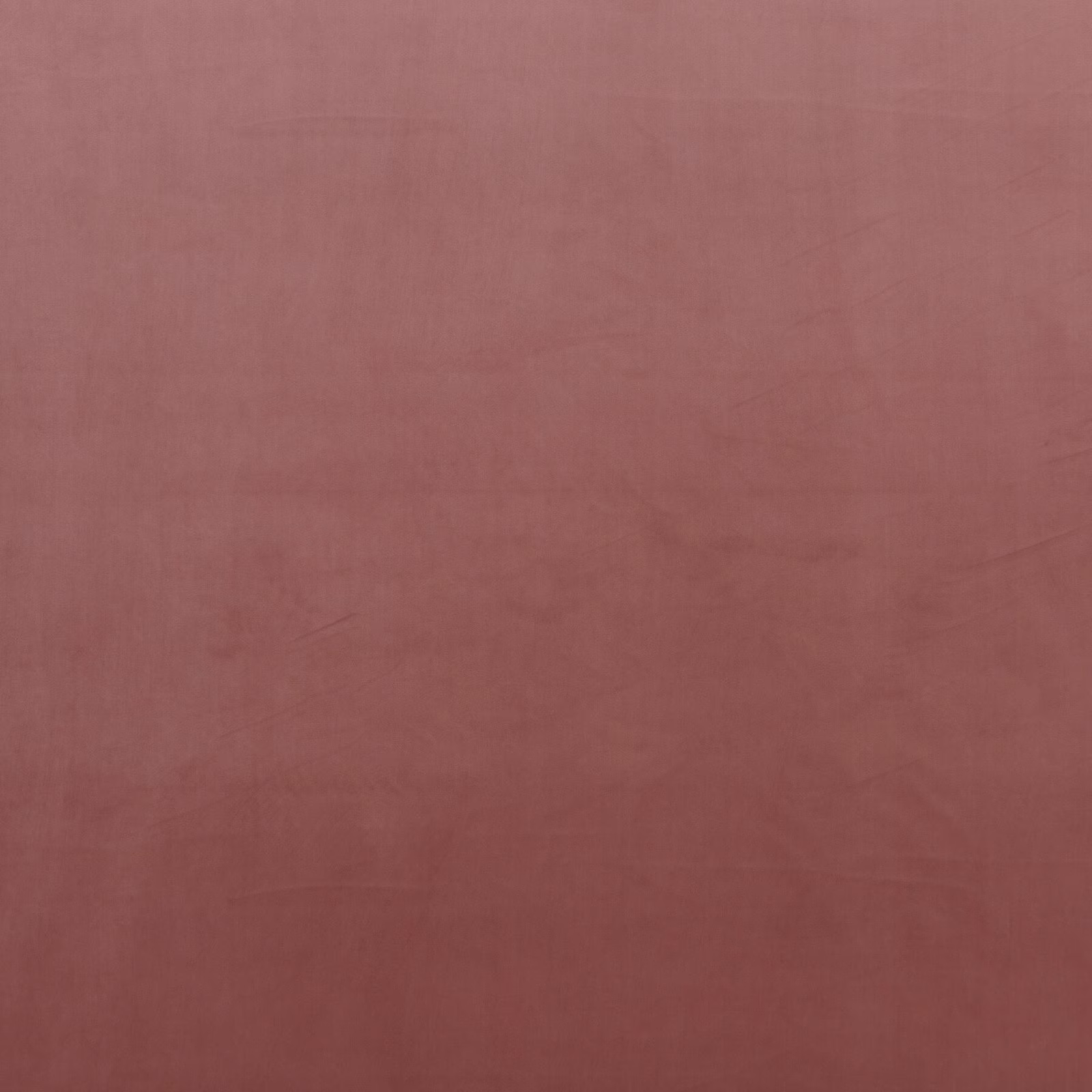 Muted dusty rose velvet with a soft, subtly directional nap