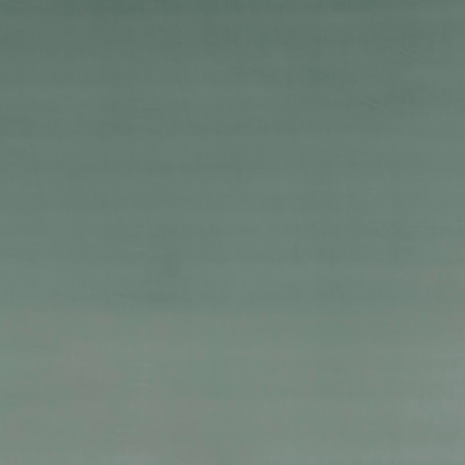 Muted sea-foam green velvet with softly directional nap and no visible motif