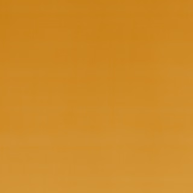 Close-up of warm sienna-orange velvet with a softly shaded, smooth pile