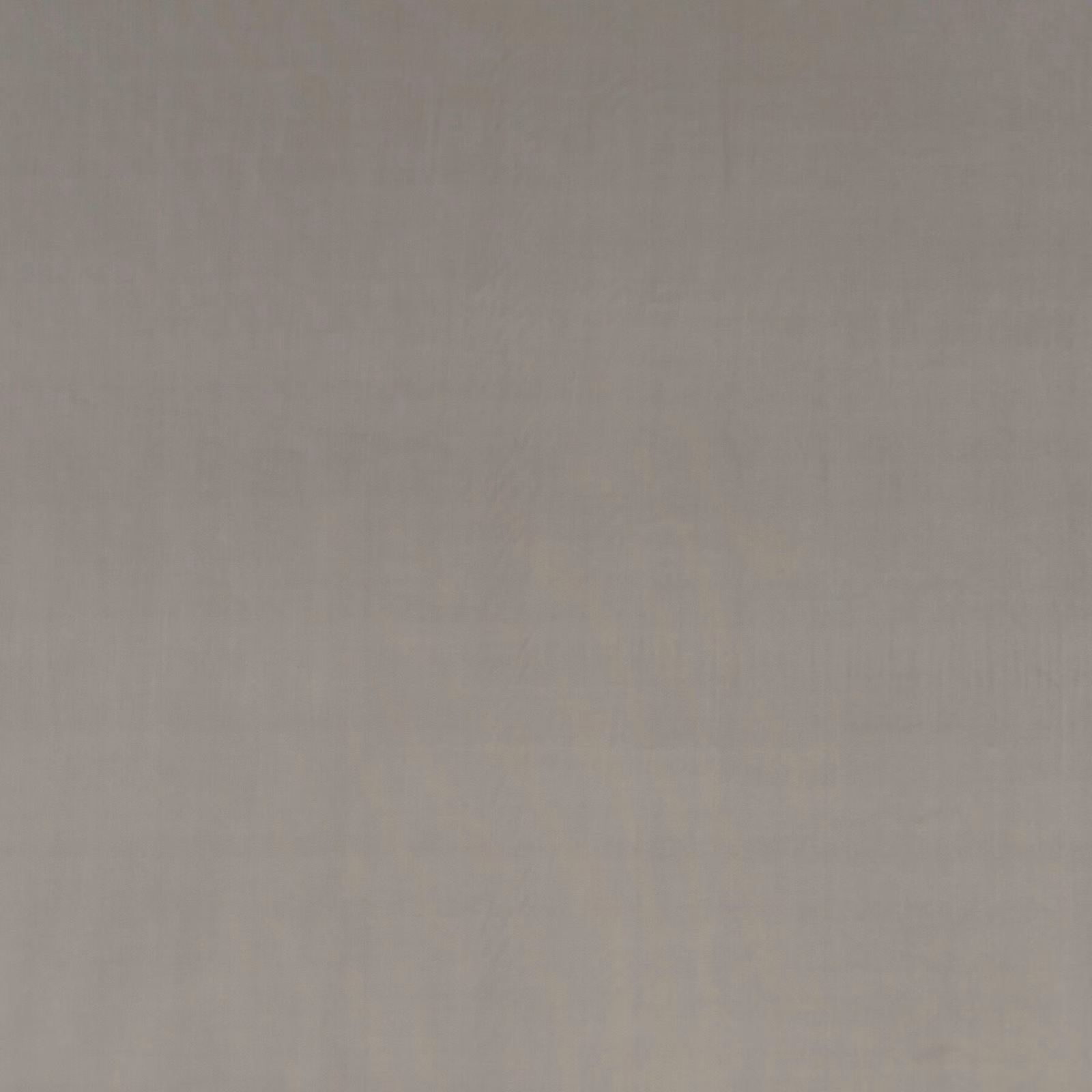 Cool silver-grey velvet with a soft directional nap and understated sheen
