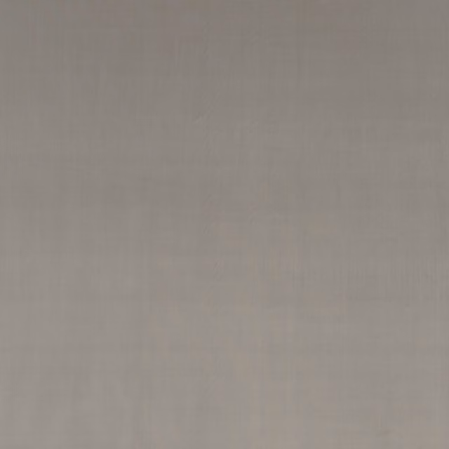 Cool silver-grey velvet with a soft directional nap and understated sheen