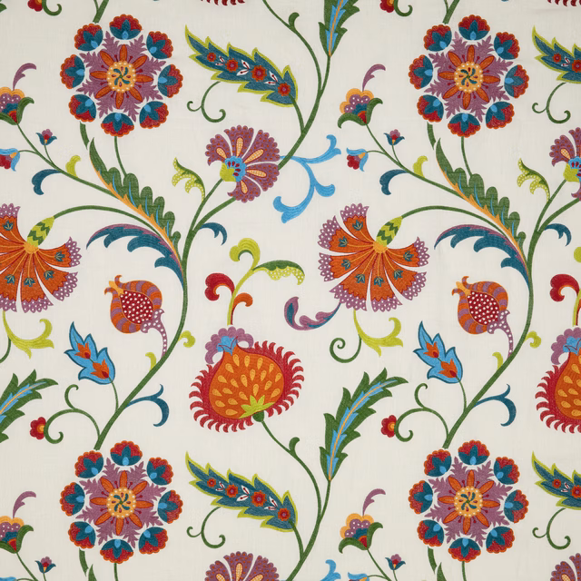 Ivory floral fabric with jewel-toned flowers, curling green stems and blue leaves