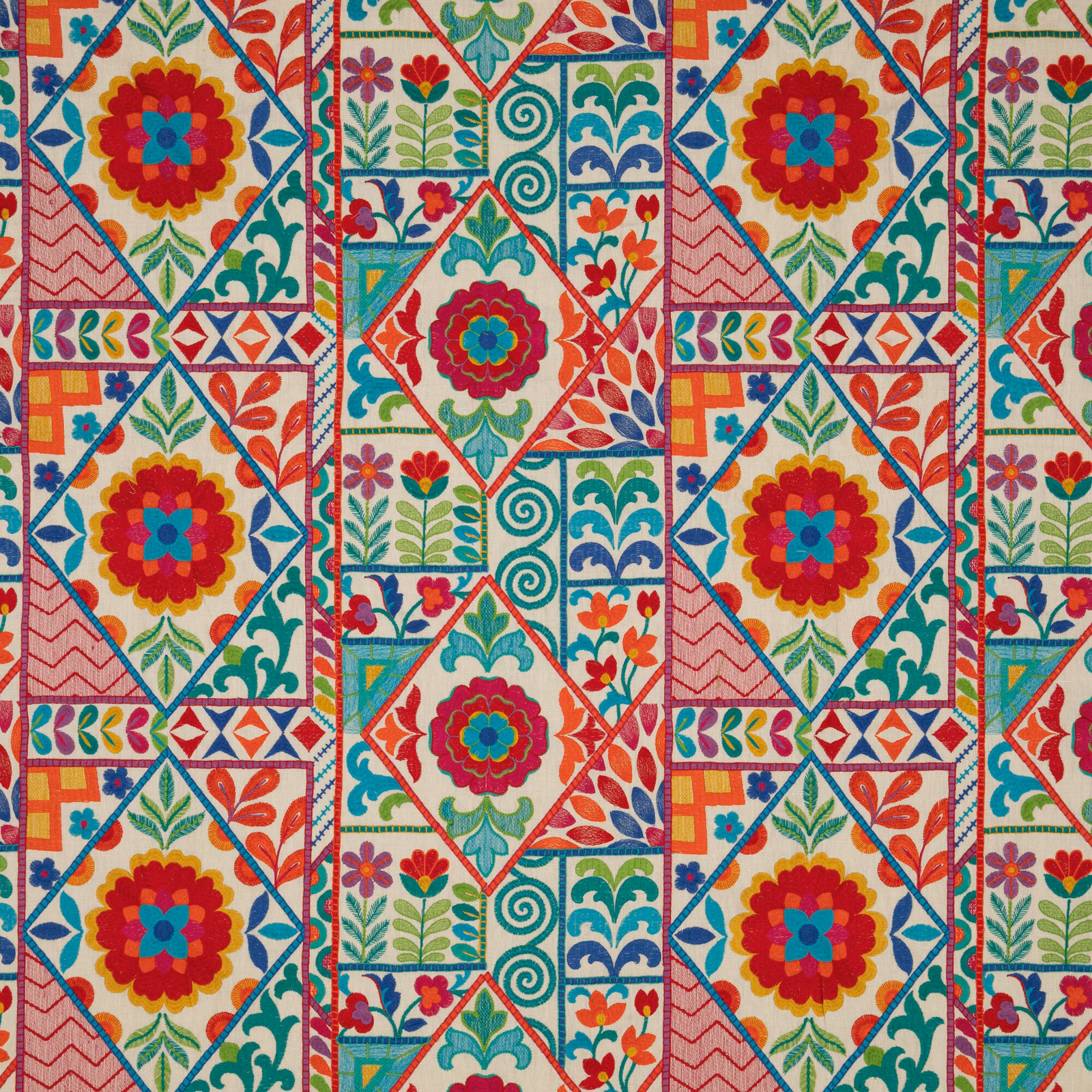 Ivory woven fabric with coral, turquoise, mustard floral and geometric patchwork motifs