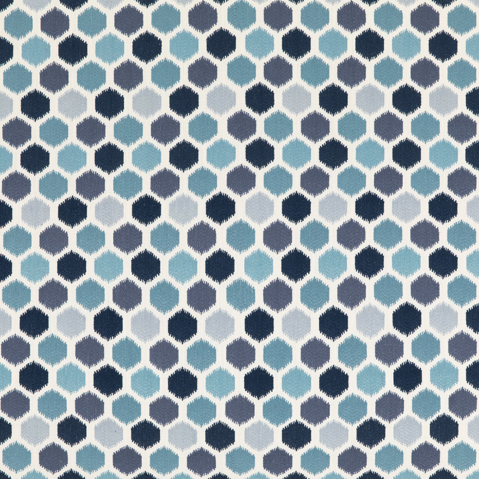 Indigo, aqua and blue-grey hexagonal geometric fabric with ivory outlines