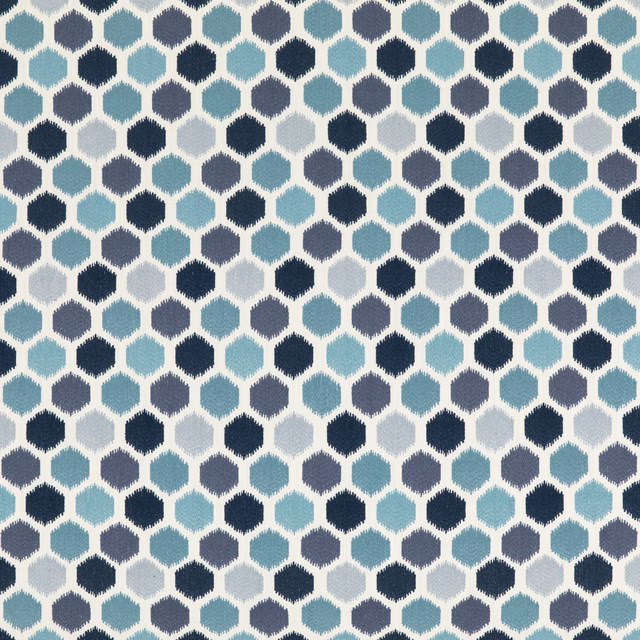 Indigo, aqua and blue-grey hexagonal geometric fabric with ivory outlines